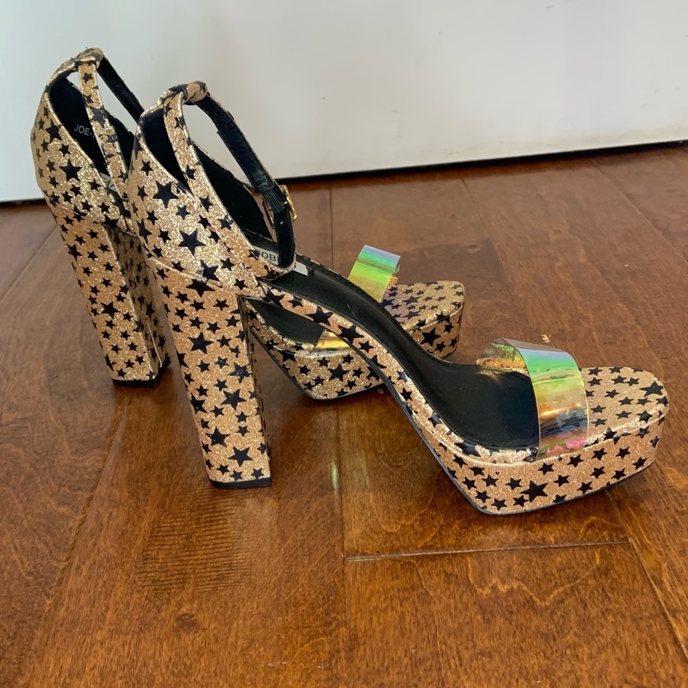 Cape Robbin glittery gold platform heels with star print and transparent upper